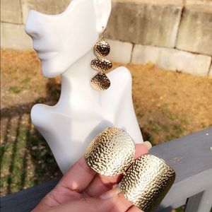 Set of gold earrings and bracelets
